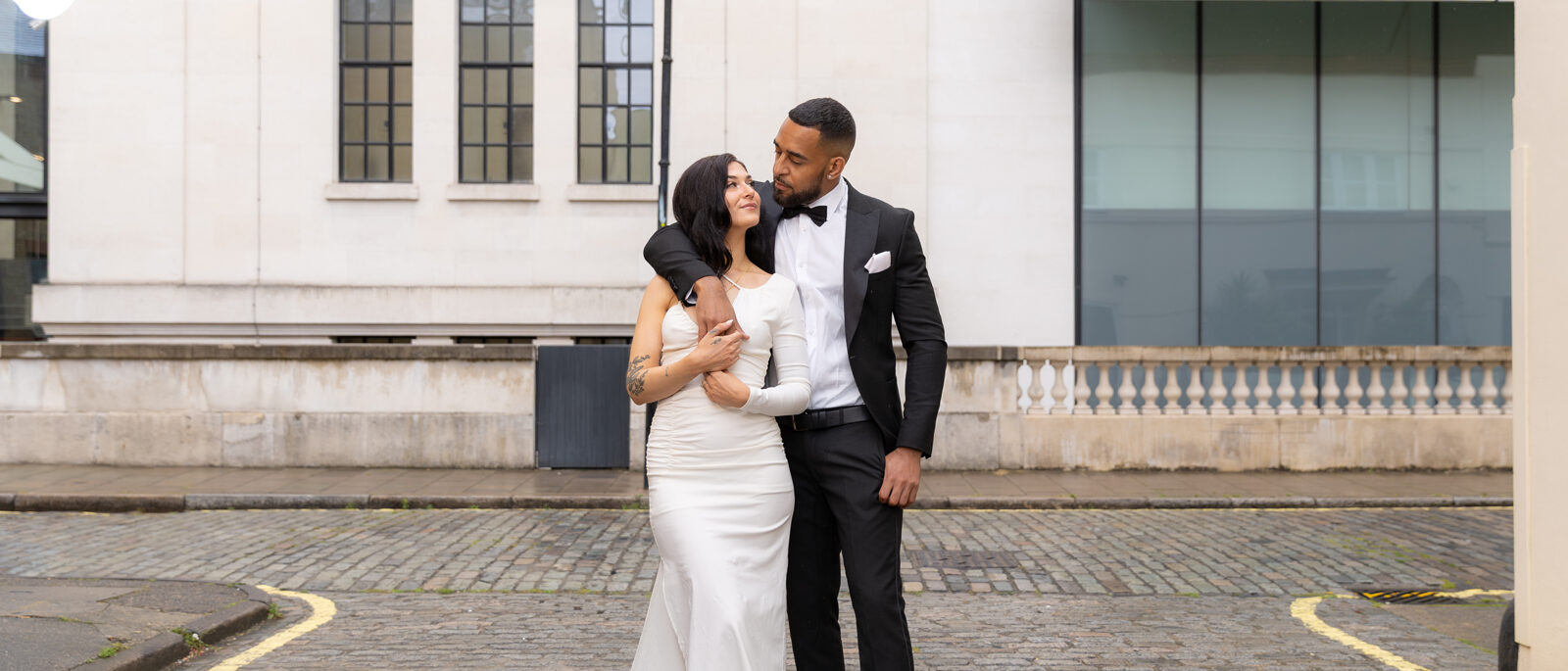 Bride and Groom portrait in front of a building in London